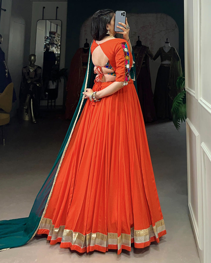 Orange Color Rayon Embossed Navratri Lehenga Choli - ETHNICDEAL