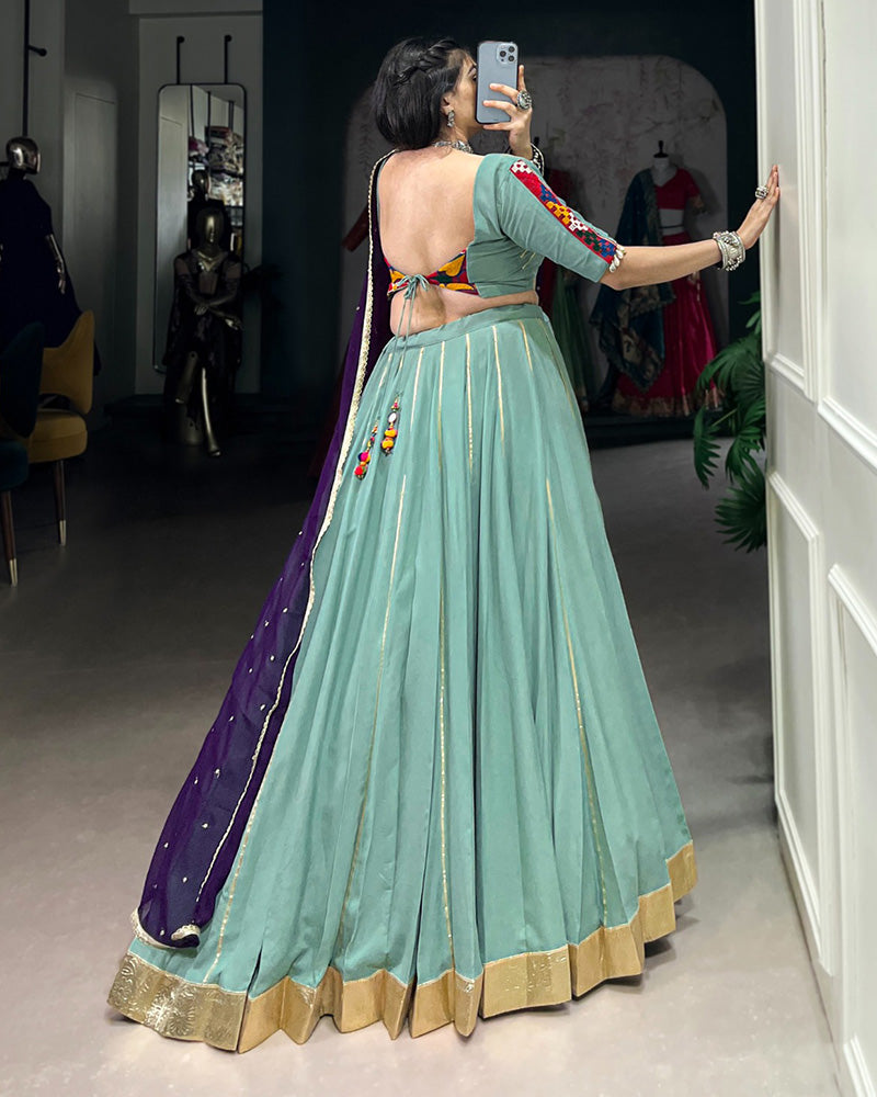 Sea Green Color Rayon Embossed Navratri Lehenga Choli - ETHNICDEAL