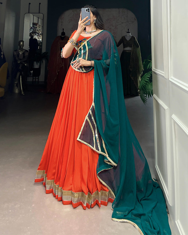 Orange Color Rayon Embossed Navratri Lehenga Choli - ETHNICDEAL