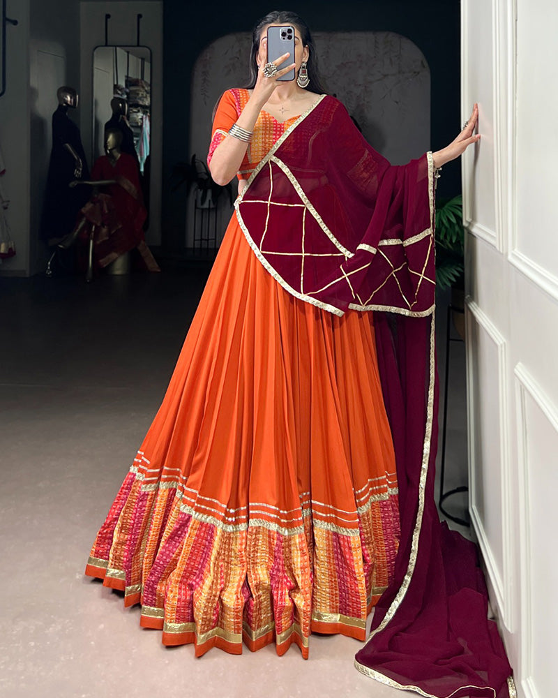 Orange Color Rayon Bnahdej Print Navratri Lehenga Choli - ETHNICDEAL