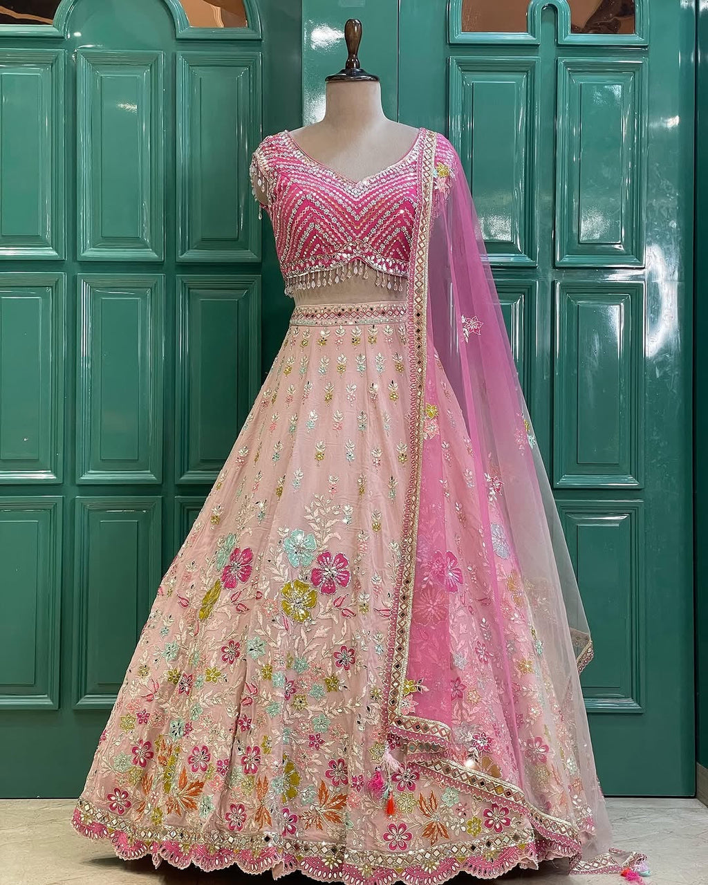 Beautiful Pastel Blush Pink Floral Mirror Work Lehenga Choli with Hot Pink Embroidered Blouse & Net Dupatta
