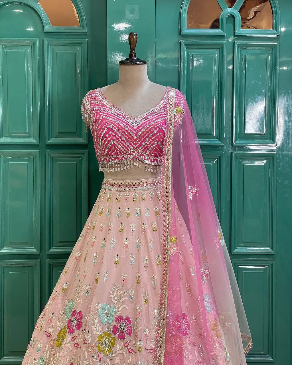 Beautiful Pastel Blush Pink Floral Mirror Work Lehenga Choli with Hot Pink Embroidered Blouse & Net Dupatta