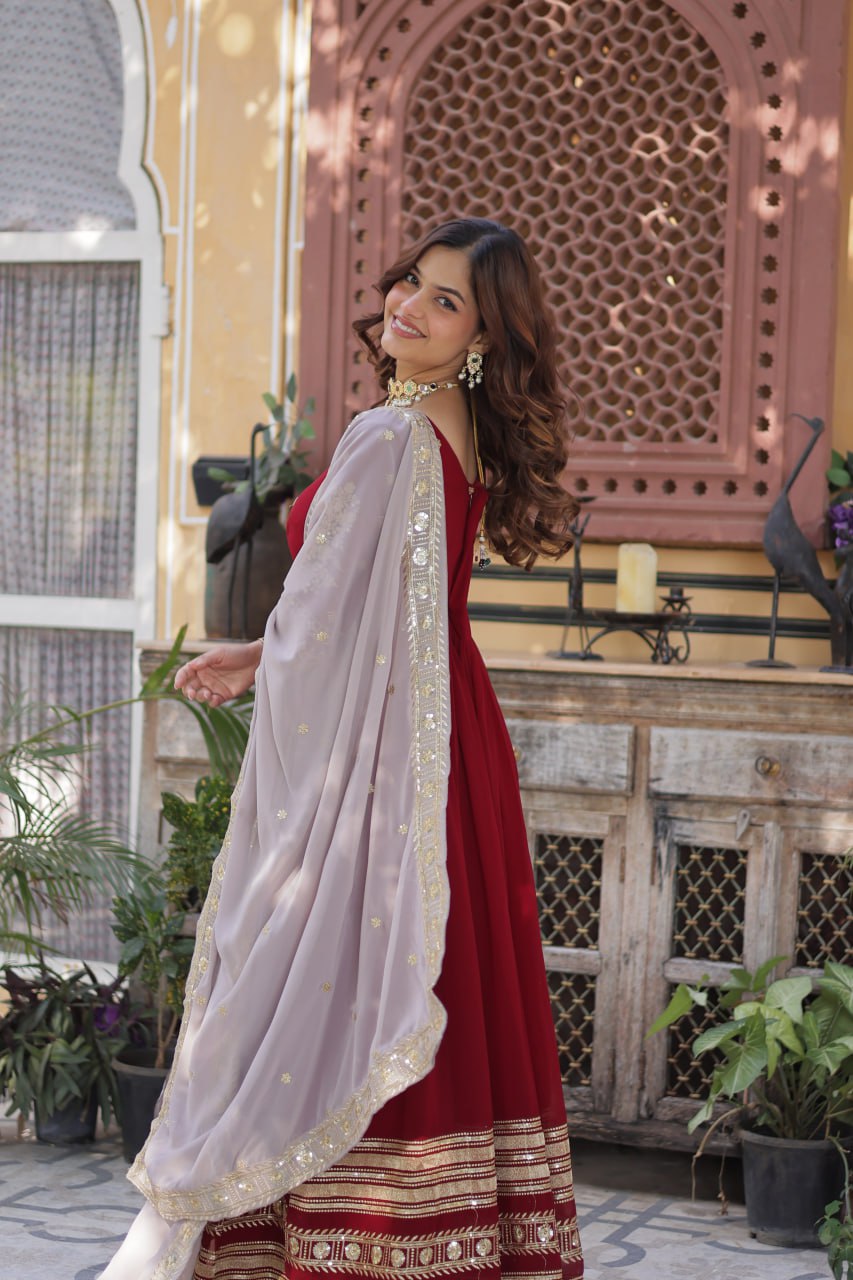 Spellbinding Maroon Faux Georgettte Embroidered Sequins Worked Gown - Ethnicwish
