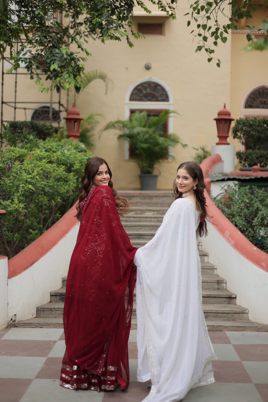 Mesmerizing Faux Georgette Sequins Thread Worked Top Sharara Suit - Ethnicwish