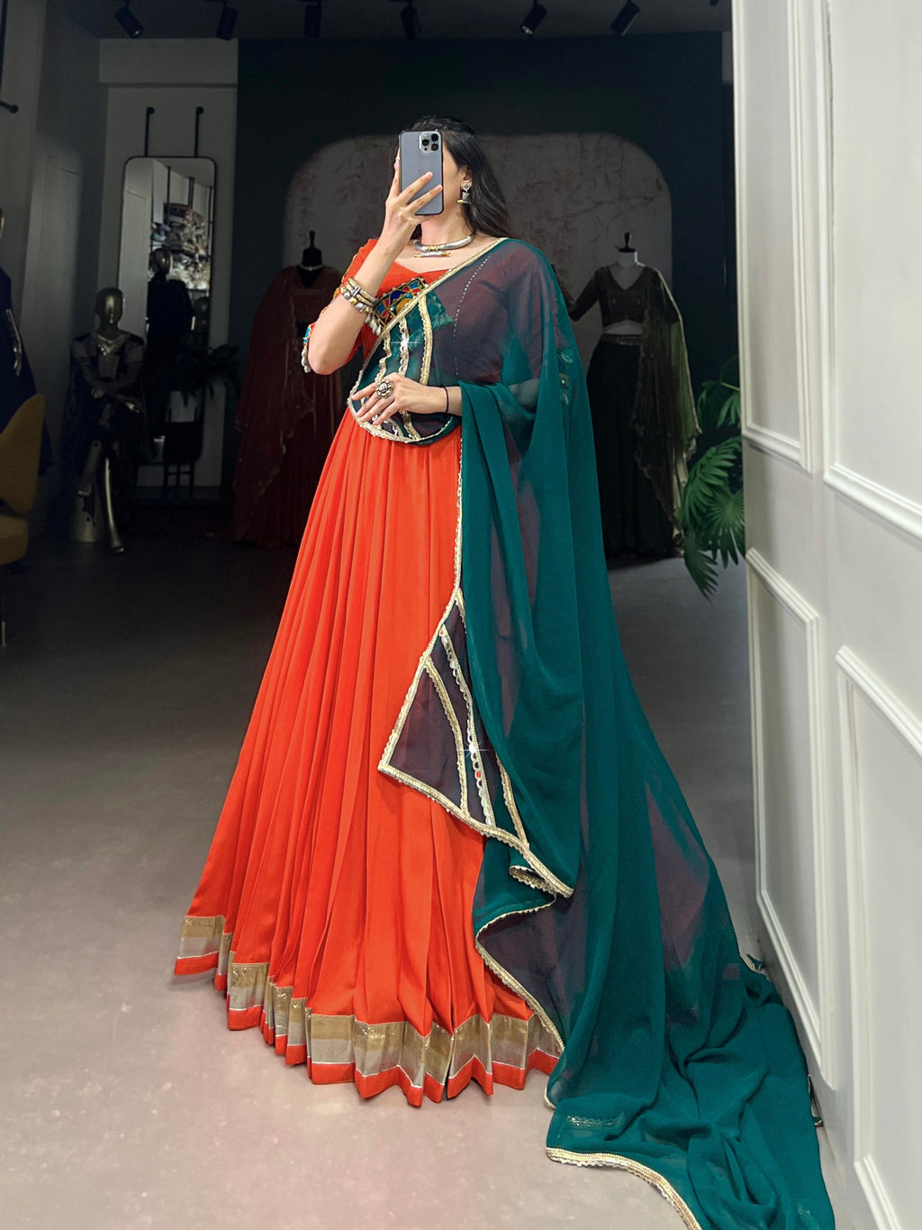 Magnificent Orange Pure Rayon Embossed Navratri Lehenga Choli - ETHNICDEAL